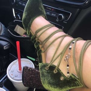 Pair of velvet green shoes w/ a sparkly gold heal!
